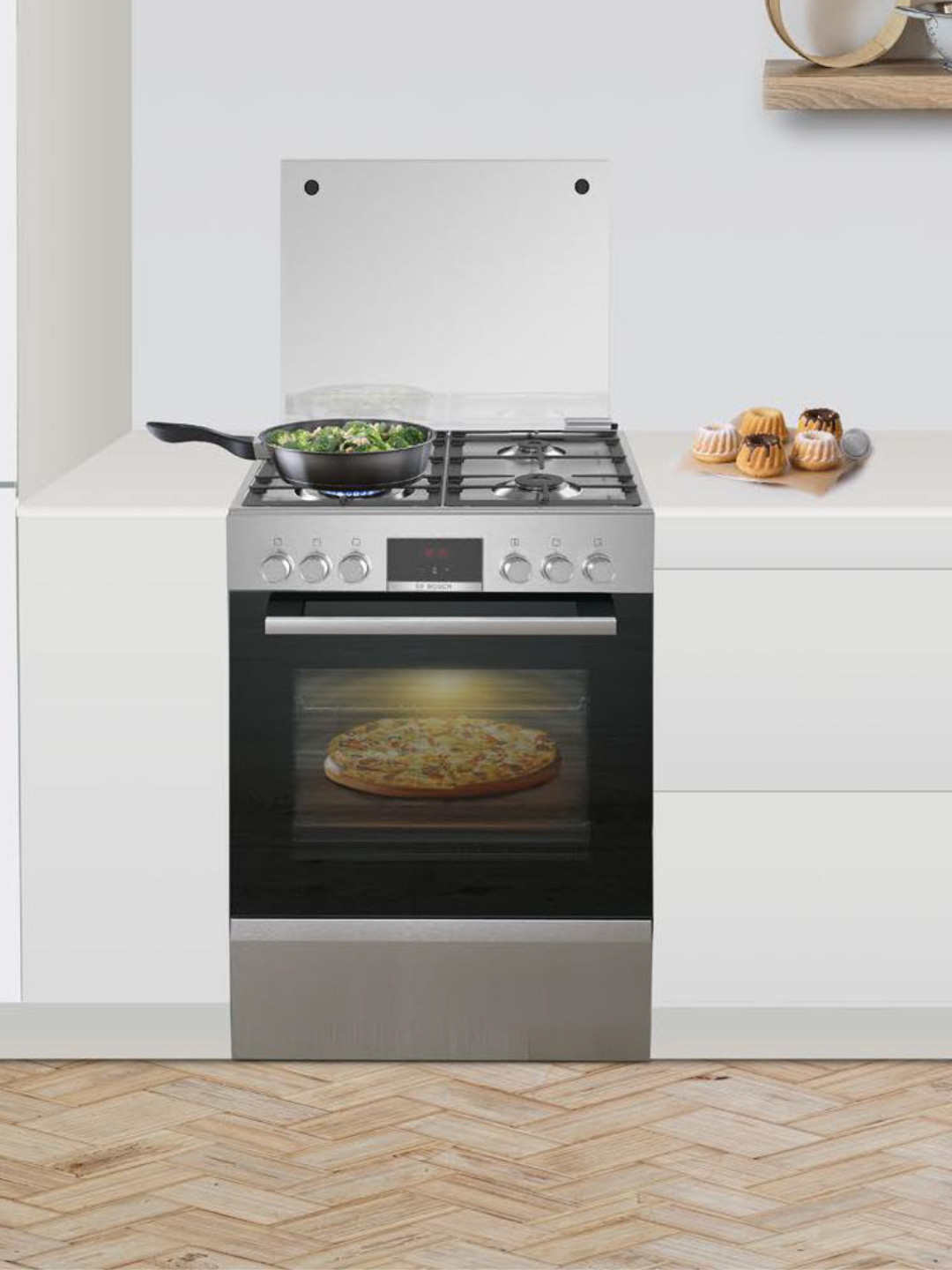 Electric stove with four burners and an oven