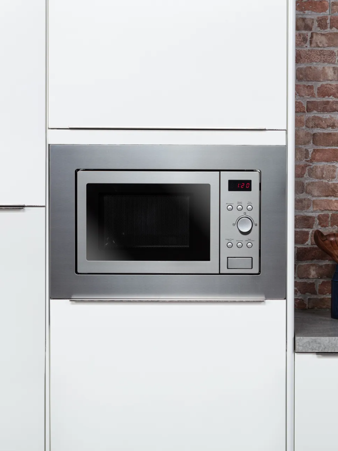 Modern microwave oven on a countertop
